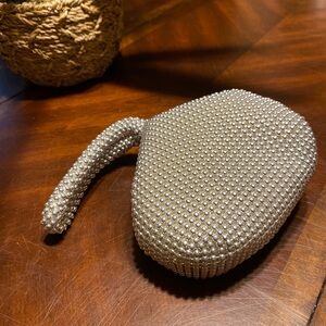 Silver Textured Oval Clutch with Wristlet